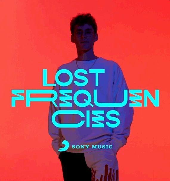 a man standing in front of a neon colored background with the words lost through ciss on it