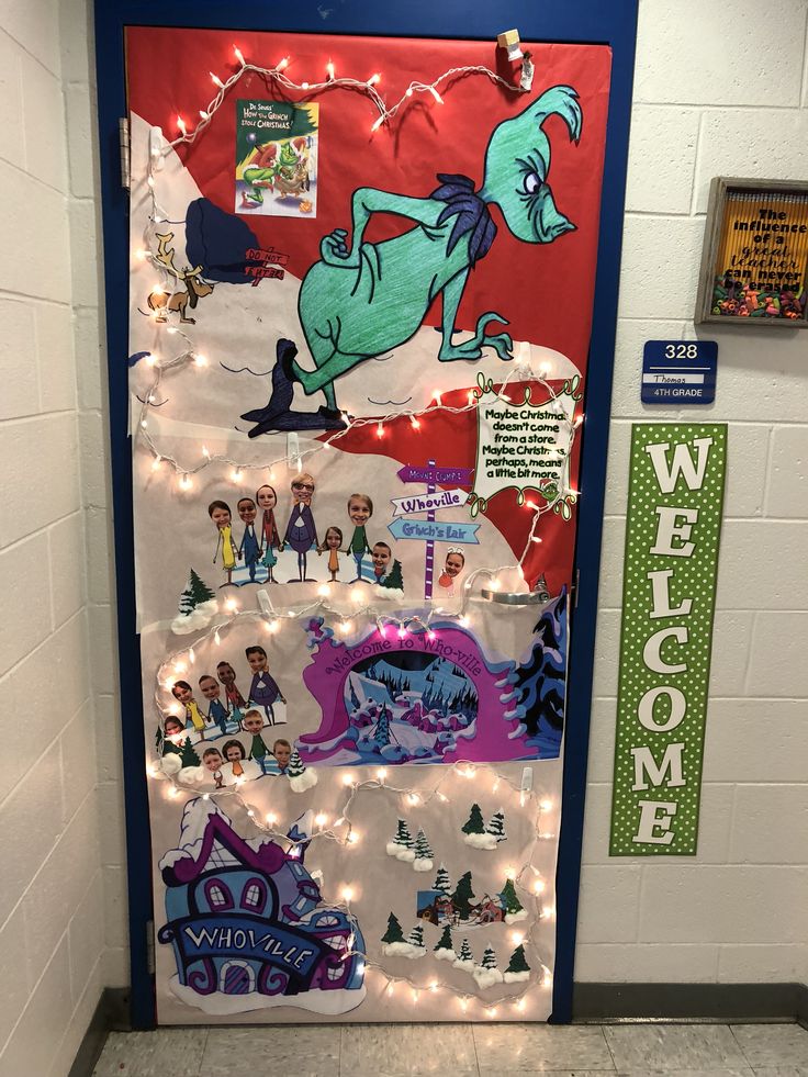 a door decorated with christmas lights and pictures on the front, along with an elf's sleigh