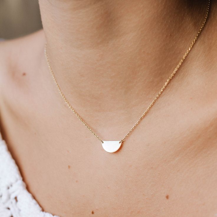 "HALF MOON NECKLACE A dainty gold chain necklace with a small half circle pendant in 9K or 14K solid gold. Minimalist design, delicate necklace ideal for everyday wearing, layered with other necklaces. This semicircle necklace is a great choice for a Mothers Day gift for mom. F E A T U R E S * Metal: High-quality Solid Gold 9K or 14K * Color: Yellow Gold, White Gold, Rose Gold * Dimensions: 15 x 7mm * Length: 16\" to 19.5\" (40cm to 50) Solid Gold jewelry is the best choice if you want your jewe Minimalist Half Moon Necklace With Adjustable Chain, Minimalist Half Moon Necklace For Everyday, Minimalist 14k Gold Half Moon Necklace, Minimalist Half Moon Yellow Gold Necklace, Minimalist Semi-circle Jewelry As Gift, Dainty Gold Chain, Half Moon Necklace, Gold Moon Necklace, Minimalist Pendant