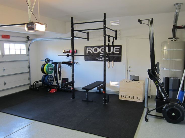 a garage with a gym equipment set up in it