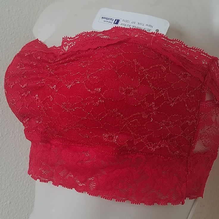 Shaped Cups Sewn Into Bra Ruching At Bustline Lined In The Front But Not The Back Soft And Stretchy Red Crop Top With Built-in Bra For Party, Red Bandeau Tube Top With Built-in Bra, Red Strapless Tube Top With Built-in Bra, Lace Strapless Tube Top Bra Friendly, Lace Strapless Bra-friendly Tube Top, Lace Bra-friendly Strapless Tube Top, Bra Friendly Lace Strapless Tube Top, Red Strapless Fitted Crop Top, Red Fitted Strapless Crop Top