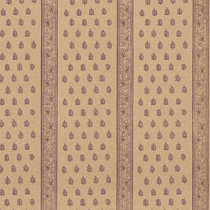 a beige and brown striped wallpaper with small dots on it's sides,