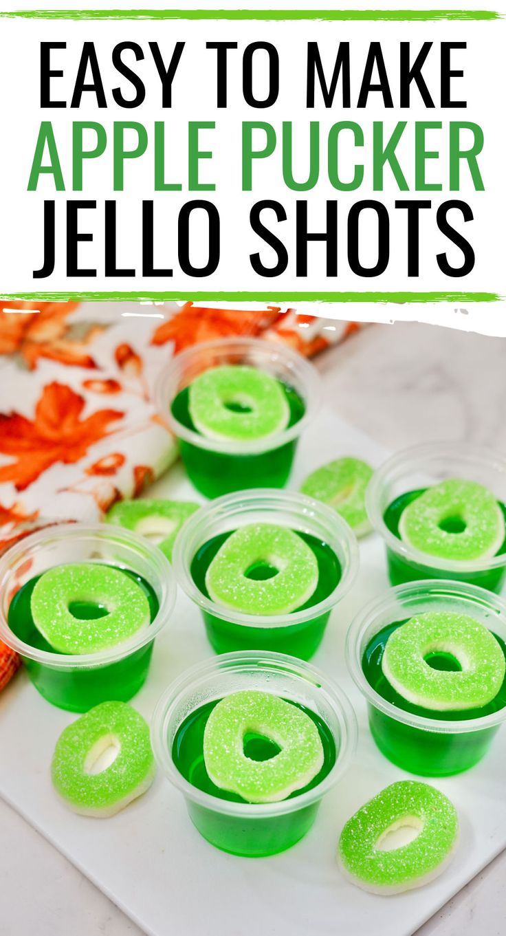 green jello shots in plastic cups with the words easy to make apple pucker jello shots