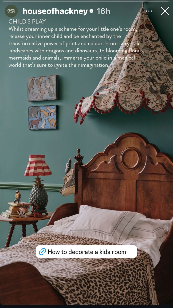 a bed room with a neatly made bed and pictures on the wall