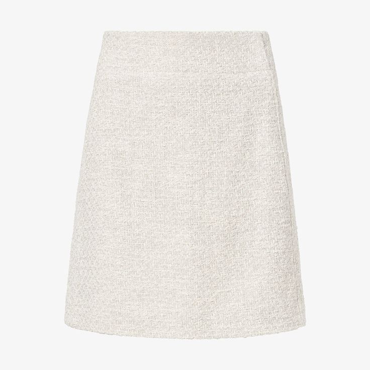 This A-line skirt is made from cotton boucle: our modern take on classic tweed, which offers comfort and structure. Dress it up with a blazer or down with your favorite sneakers—you really can’t go wrong. Designed specifically for petites, the Rowley should hit above the knee on most women who are 5'4" or under. Classic Cotton Lined Mini Skirt, Classic Cotton Mini Skirt With Lining, Elegant Tweed Mini Skirt With Lining, Elegant Tweed Lined Mini Skirt, Classic Tweed Skirt For Formal Occasions, Classic Formal Tweed Skirt, Elegant Cotton Pleated Mini Skirt, Elegant Cotton Lined Mini Skirt, Classic Tweed Skirt For Work