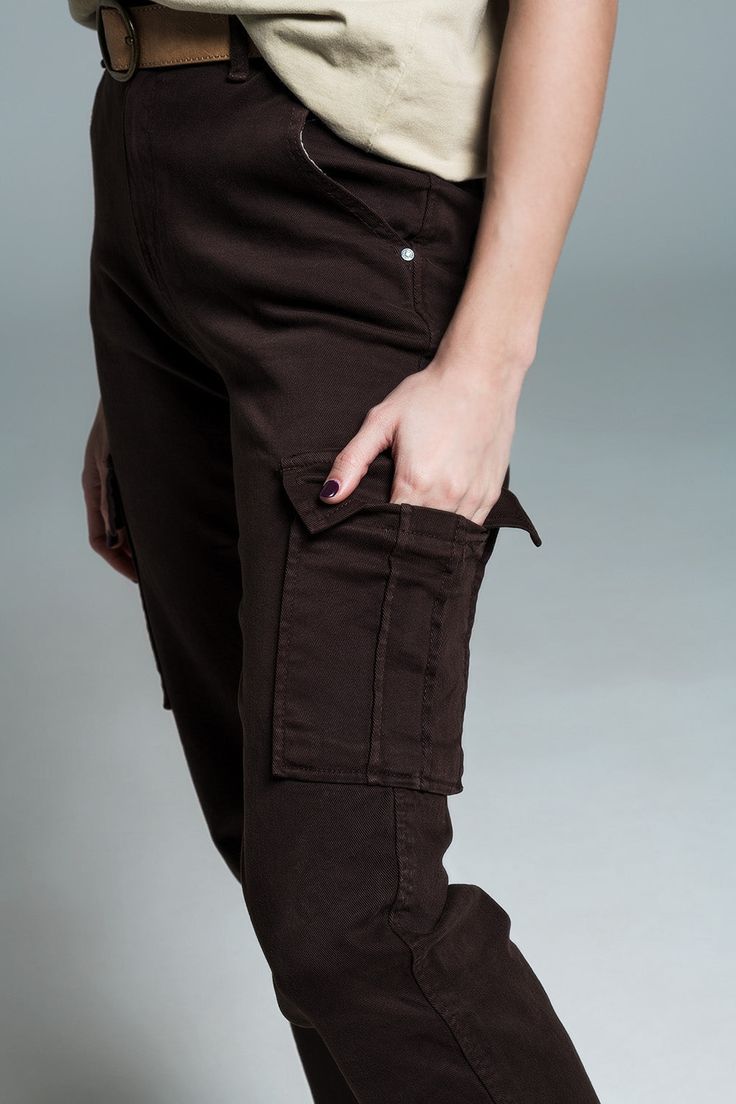 Introducing our Dark Brown Cargo Pants, an essential addition to any fashion-forward wardrobe that values both style and practicality. Quality Material: These cargo pants are expertly crafted from 98% Cotton and 2% Elastane, ensuring both durability and comfort. The addition of elastane provides that extra bit of stretch, making these pants perfect for active wear or a busy day out. Versatile Pocket Design: Equipped with six functional pockets, these cargo pants offer ample storage for your esse Brown Wide Leg Cargo Jeans With Pockets, Brown Mid-rise Pants With Hip Pockets, Mid-rise Brown Pants With Hip Pockets, Brown Utility Parachute Pants, Brown Utility Parachute Pants Full Length, Brown Utility Style Mid-rise Cargo Pants, Brown Mid-rise Utility Cargo Pants, Brown Wide-leg Cargo Jeans With Side Pockets, Utility Brown Mid-rise Cargo Pants