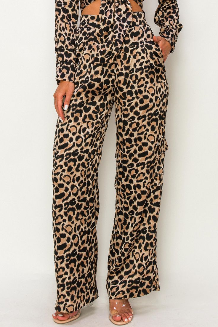 • SKU: P-2129• S-M-L• Hand wash only• Roar with fashion-forward style in our Cheetah High-Waisted Gaucho Pants. Embrace the fierce and fabulous look of cheetah print while enjoying the comfort and flattering fit of the high-waisted gaucho design - perfect for making a bold statement wherever you go. Stretch Bottoms With Cargo Pockets For Loungewear, Non-stretch Bottoms With Side Pockets For Loungewear, Trendy Relaxed Fit Bottoms For Fall, High Waist Stretch Cargo Pants For Loungewear, High Waist Wide Leg Pants For Fall Loungewear, Straight Leg Bottoms For Fall Loungewear, Fall Loungewear High-waisted Pants, Fall Jeans With Elastic Waistband, Chic Cargo Pants With Elastic Waistband For Loungewear