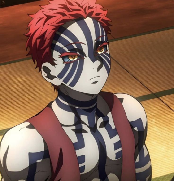 an anime character with red hair and black and white stripes on his body, staring at the camera