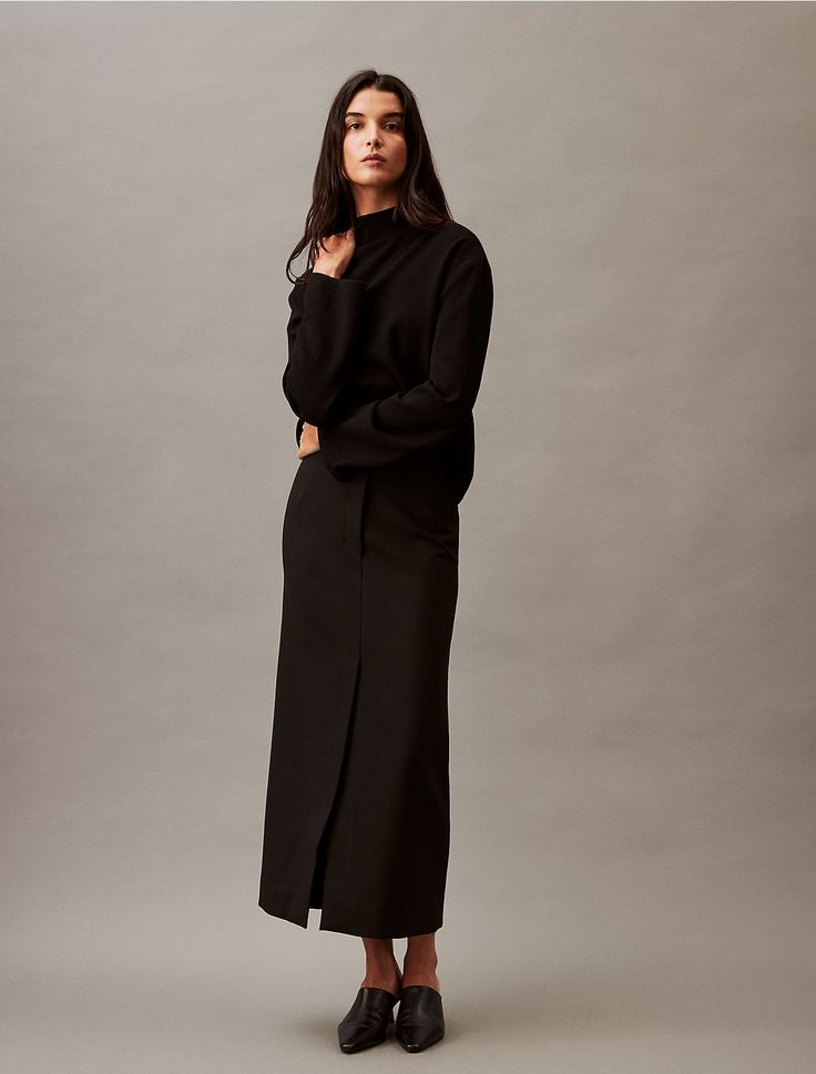 A modern style with unexpected detailing, this structured skirt is crafted with stretch for added flexibility. Cut with a clean finish high-waist silhouette and a single vent at the front.  Material: 66% Polyester, 29% Viscose, 5% Elastane. Structured Skirt, Stretches For Flexibility, Smart Outfit, Stretch Skirt, Modern Style, Winter Fashion, Calvin Klein, High Waist, High Waisted