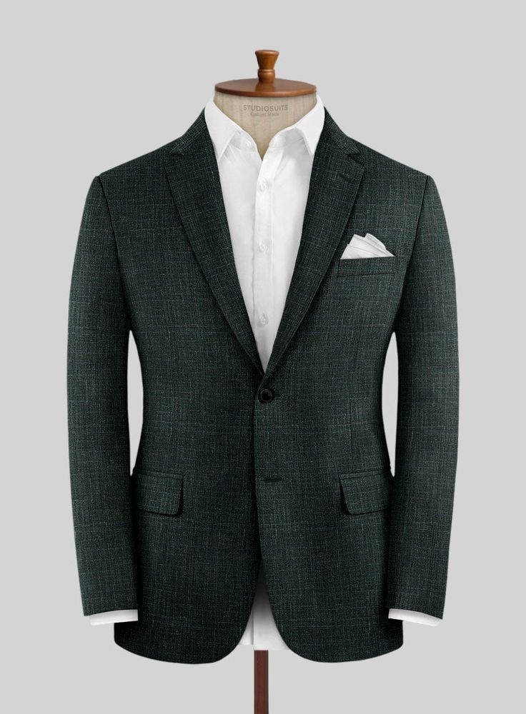 Bask in the glow of cultivated poise with the Loro Piana Delgado Wool Silk Linen Jacket. Crafted from a premium blend of wool, silk, and linen, this jacket synthesizes luxury and comfort, embodying the ideal fusion of opulence and relaxation. The lush fabric ensures breathability and a silky-smooth touch, while the striking green hue and classic plaid pattern add a contemporary twist to perennial grace. With impeccable tailoring and refined design, it exudes confidence and perpetual fascination. Catering to both upscale business meetings or chic evening affairs, this jacket proves to be a versatile choice for any event, making it a staple for the modern gentleman's wardrobe.    A marriage of elegance and comfort, Loro Piana fabrics are made using the highest quality raw materials in the wo Formal Green Linen Blazer, Green Linen Blazer For Formal Occasions, Winter Silk Blazer With Notch Lapel, Luxury Linen Suits For Fall, Luxury Linen Suit For Fall, Luxury Linen Formal Outerwear, Green Linen Business Blazer, Luxury Linen Outerwear For Formal Occasions, Elegant Green Linen Suits