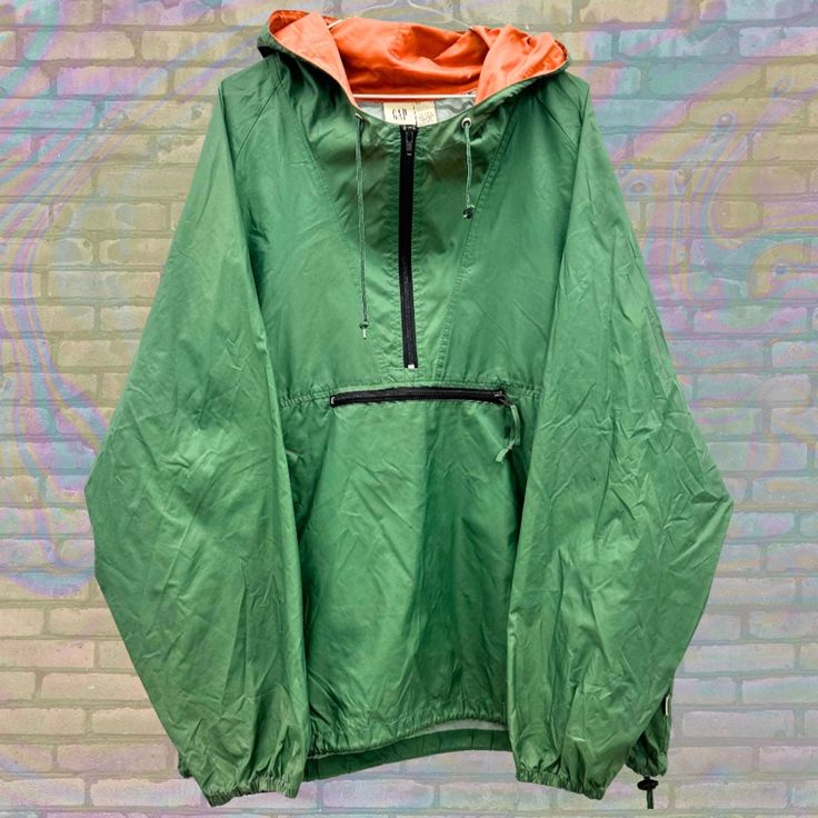 Label size: Double Extra Large Recommended size: 'Double Extra Large How it fits: Regular Pit to pit: 27" Shoulder to bottom: 31" Flaws: Photos show marks if any Material: 100% Nylon Era: 90s Colour: Green, Orange Green Pullover, 90s Colors, Retro 90s, Pullover Jacket, Label Sizes, Green Orange, Extra Large, Gap, Gender Neutral