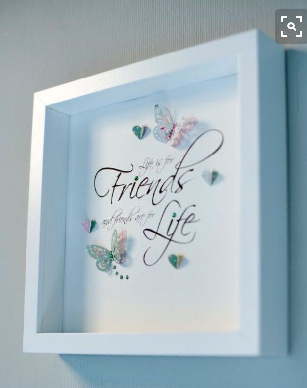 a white frame with butterflies and the words friends life written in cursive writing