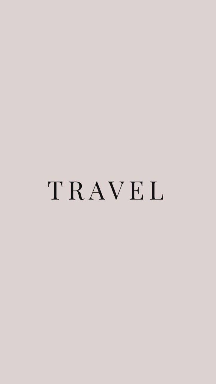 the word travel written in black on a gray background