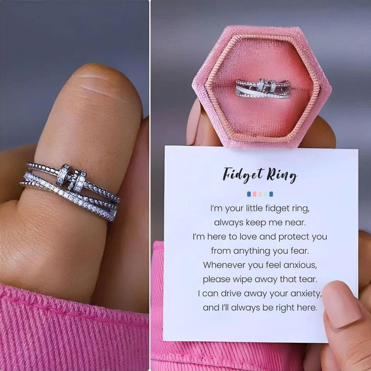 a person holding up a ring with a note attached to it and an image of the ring