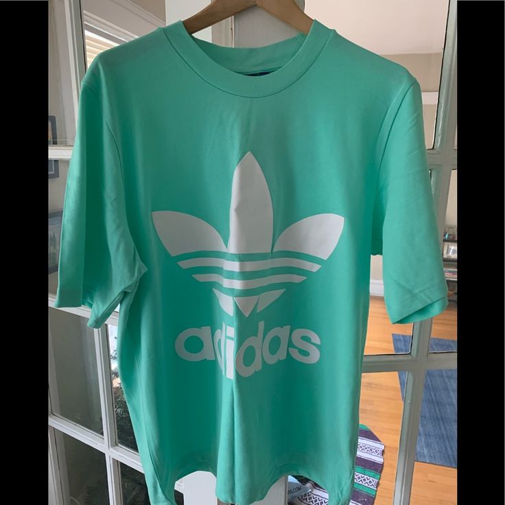 Adidas Mint Box Fit T-Shirt Never Been Worn W/Tags Size M Box Fit In Mint/Excellent/Flawless Condition 100% Cotton Smoke/Pet Free Home Deep Wrinkle/Wrinkles Will Come Out In Simple Machine Wash And Machine Dry Spring Adidas Logo Top With Relaxed Fit, Spring Adidas Logo Relaxed Fit Tops, Green Athleisure Tops With Three Stripes Branding, Green Casual Tops With Branding, Casual Green Tops With Branding, Adidas Logo Crew Neck Top For Spring, Adidas Summer Tops With Crew Neck, Adidas Green Top For Spring, Green Adidas Top For Spring