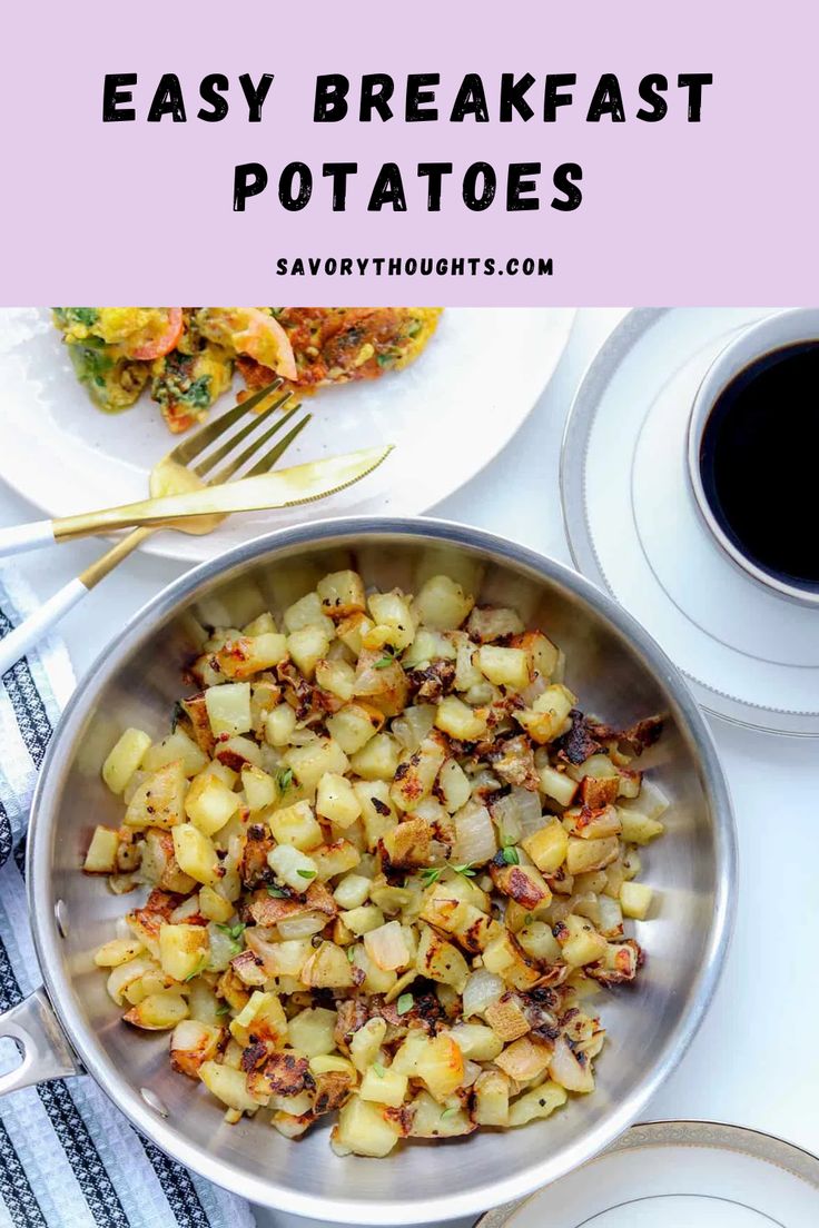 a bowl filled with potatoes on top of a white table next to plates and silverware