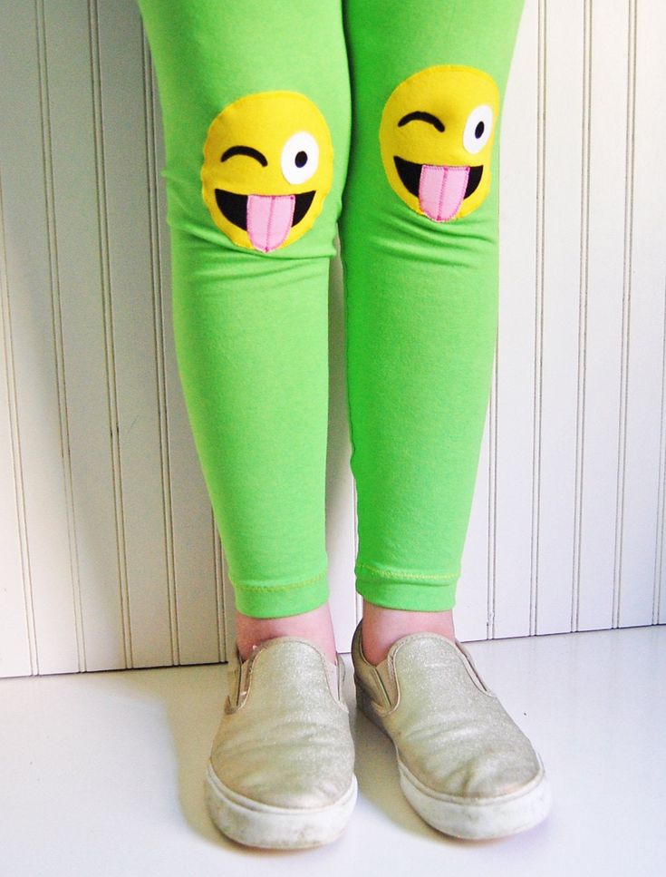 {DESCRIPTION} These fun and functional knee patch leggings are not only adorable, but they are made to last. Made with bright apple-green, medium-weight cotton lycra, these leggings are reinforced at the knees with yellow, crazy face emojis to protect your kiddo's delicate knees from playground wear and tear. Please note these leggings are handmade and some slight variation may occur. Leggings have an elastic non-roll waist band for a comfortable fit. Perfect for your emoji-obsessed kiddo! Meets Playful Elastic Bottoms For Spring, Playful Fitted Bottoms For School, Playful Bottoms For School In Spring, Playful Fitted Bottoms For Playtime, Playful Fitted Playtime Bottoms, Stretch Cotton Fun Bottoms, Playful Cotton Leggings For Playtime, Playful Spring Leggings For Playwear, Playful Spring Playwear Leggings