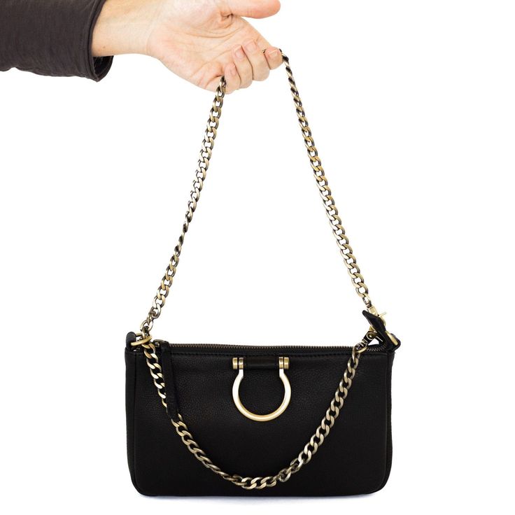 Add a bold look to any of your sapahn bags with this chain strap. Depending on the style of the bag, this brass strap can be used as a crossbody strap, as a shoulder strap, or as a fun accessory to make a statement. With beautiful brass chain link detailing, this is the perfect addition to take your bag from day to night or from understated to bold.  With two lengths available, you are able to find the fit that works best for you! This strap is narrower and longer than our chain shoulder strap. Gold Crossbody Wallet On Chain With Chain Strap, Gold Crossbody Wallet On Chain, Gold Wallet On Chain With Crossbody Strap, Chic Wallet On Chain With Chain Strap, Chic Gold Wallet On Chain With Chain Strap, Rectangular Wallet On Chain For Everyday Use, Everyday Rectangular Wallet On Chain With Strap, Chic Wallet On Chain With Metal Hardware, Elegant Wallet On Chain For Daily Use