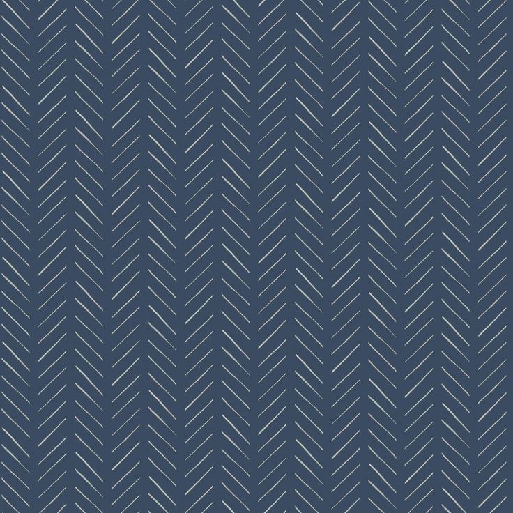 a blue and white herringbone pattern with diagonal lines on the bottom half of it