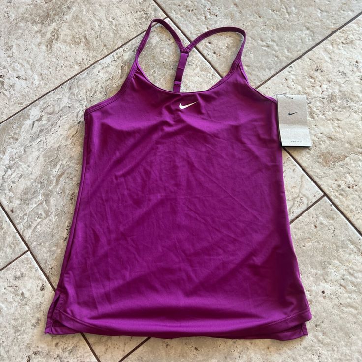 Perfect For Runs, Hot Workouts. Light Material And Super Soft. Never Worn Purple Racerback Workout Top, Purple Racerback Top For Gym, Purple Tank Top For Gym, Purple Stretch Racerback Top, Casual Purple Tank Top For Sports, Purple Sports Tank Top For Summer, Purple Racerback Tank Top For Workout, Nike Purple Tops For Spring, Purple Fitted Athleisure Tank Top