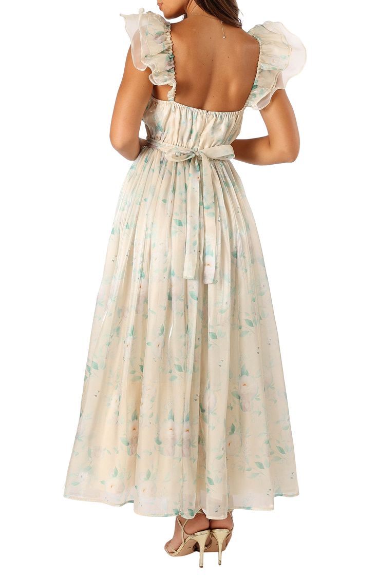 Flutter with fairytale style in a pretty maxi dress romanticized by tiered ruffles at the shoulders, a flowy skirt with tulle overlay and dreamy floral print. Hidden back-zip closure Sweetheart neck Short sleeves Lined 100% polyester Hand wash, line dry Imported Fairytale Style, Pretty Maxi Dress, Satin Dresses Long, Satin Dresses Long Sleeve, Black Tie Wedding Guests, White Dress Shoes, Ruffle Maxi Dress, Chiffon Overlay, Resort Dresses