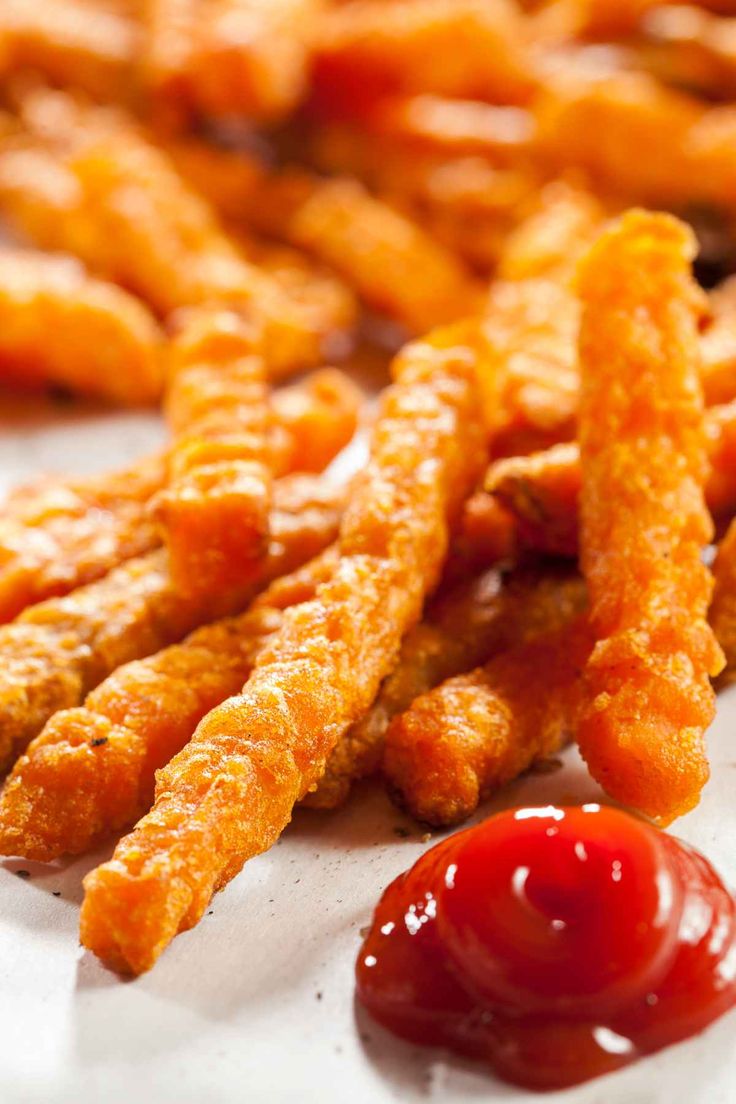 some fried food with ketchup on the side