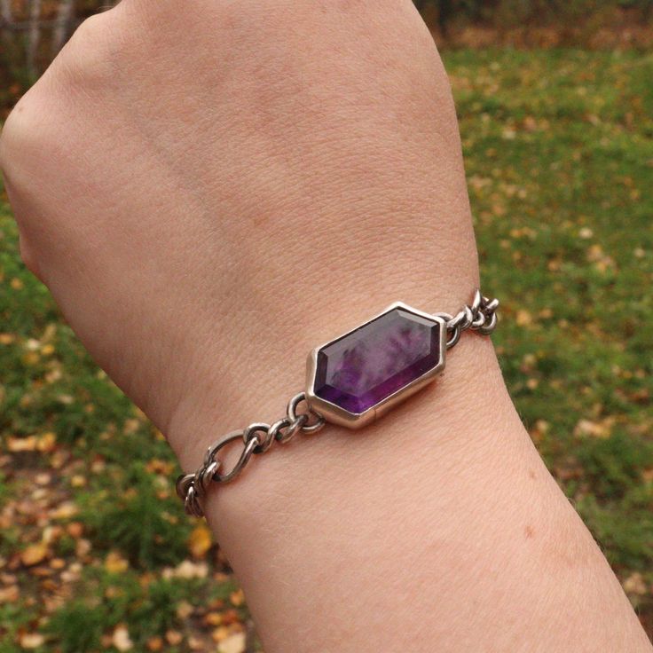 A rich purple amethyst makes this simple everyday chain transform into an iconic style accessory. Stone meanings: Amethyst is associated with the Third Eye and Crown chakras, which are said to promote spiritual growth, intuition, and higher consciousness. Amethyst is said to promote clarity and insight, and to calm the mind. Details: This unique bracelet features up cycled silver chain and a beautifully cut amethyst stone. All Bracelets are able to be made shorter. If you need additional chain o Spiritual Sterling Silver Chain Bracelet, Purple Spiritual Jewelry For Everyday, Spiritual Purple Jewelry For Everyday, Everyday Spiritual Purple Jewelry, Stone Meanings, The Third Eye, Higher Consciousness, Rich Purple, Pin Pendant