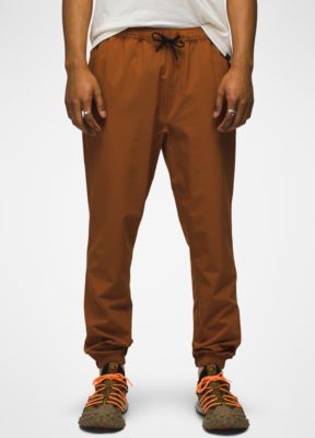 A Stretch-woven Jogger Made For Outdoor Activities Like Hiking Or Bouldering. Casual Moisture-wicking Joggers For Outdoor, Casual 4-way Stretch Joggers For Outdoor, Spring Streetwear Joggers With Elastic Side Panels, Brown Sporty Activewear With Elastic Waistband, Sporty Brown Sports Pants, Urban Sports Joggers With Tapered Leg, Brown Relaxed Fit Sporty Activewear, Casual 4-way Stretch Joggers For Jogging, Outdoor Sporty Joggers With Relaxed Fit