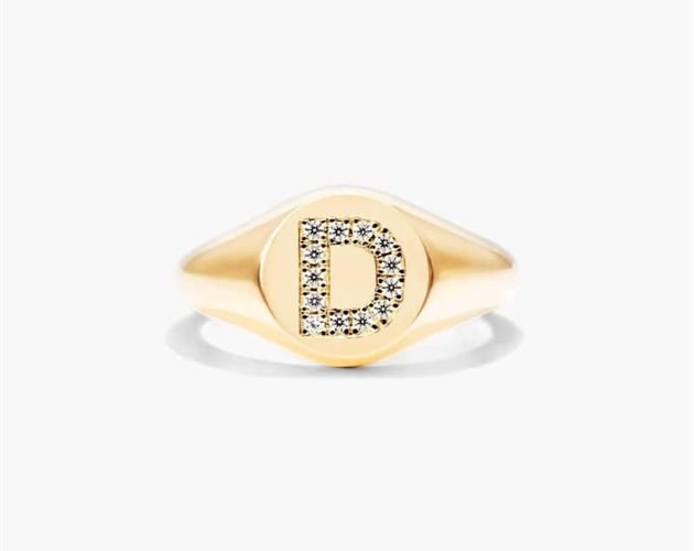 14K Yellow Gold Diamond D Initial Signet Ring. This timeless ring will dazzle all who see it. Perfect for any age and occasion, this ring makes the perfect individualized gift! Classic Diamond Initial Ring As Gift, Classic Initial Ring With Diamond Accents For Formal Occasions, Classic Gold Initial Ring With Brilliant Cut, Classic Yellow Gold Initial Ring With Brilliant Cut, Classic Gold Initial Ring With Diamond, Classic Gold Diamond Initial Ring, Elegant Personalized Diamond Signet Ring, Personalized Gold Diamond Ring In Luxury Style, Round Cut Signet Ring With Diamond Accents For Gift