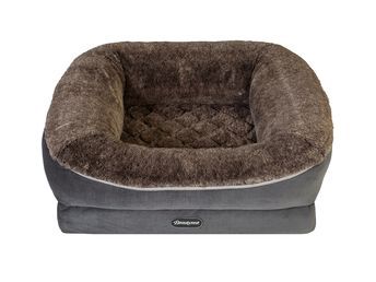 the dog bed is made out of plush material