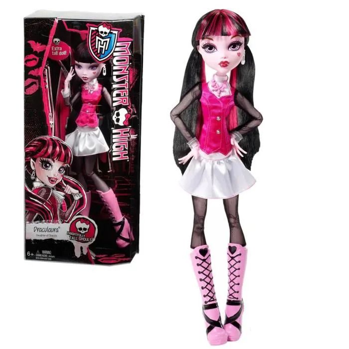 a doll with red hair and pink shoes in front of a package for the doll