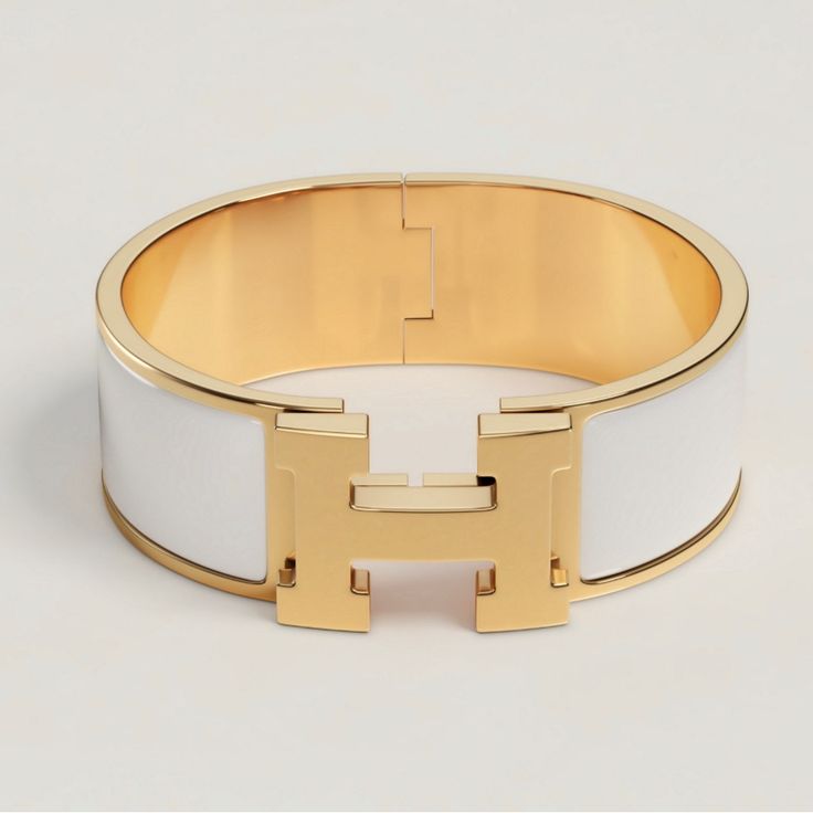 Wide Bracelet In Enamel With Gold-Plated Hardware. Made In France Circumference: 7" | Width: 0.79" Size Pm Purchased At Hermes Boutique In Miami. Luxury White Cuff Bracelet, Designer White Jewelry For Everyday Luxury, Modern White Bangle For Formal Occasion, Designer White Jewelry For Everyday Wear, Luxury White Bangle Jewelry, Elegant White Cuff Bracelet For Formal Occasions, Elegant White Bangle For Formal Occasions, Classic White Bracelets For Everyday Luxury, White Bracelet Strap Jewelry For Formal Occasions