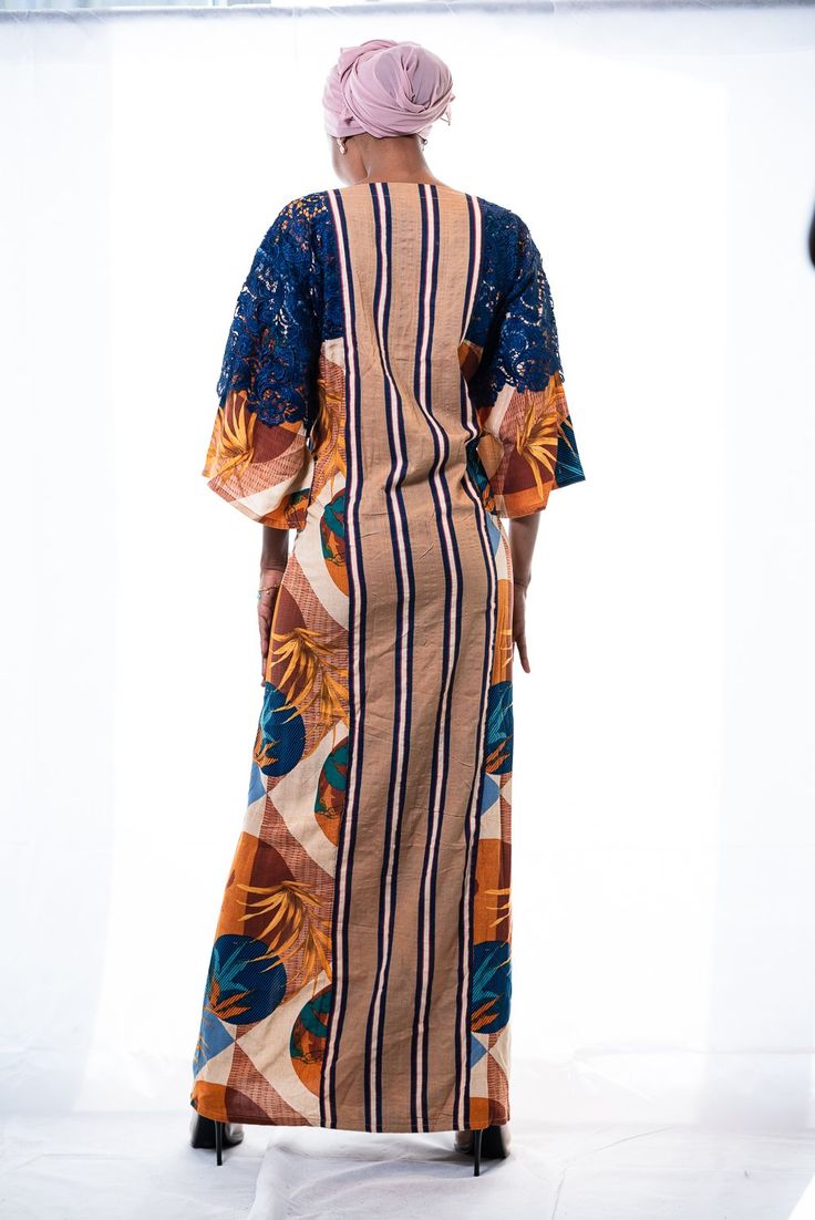 DESIGNER'S NOTE: Cotton Kaftan Maxi Dress. Envelope yourself in comfortable elegance wearing this floor-skimming kaftan that artfully fuses 3 different fabrics to stunning effect. The mixed print cotton used for the kaftan is beautifully complemented by dramatic lace sleeves and the striped brown and navy striped cotton used in the middle. Designed to flatter your curves. Comfy chic. And it has pockets!CUSTOM MADE: Designed especially for you to ensure a perfect fit according to your height and Multicolor Maxi Kaftan With Printed Motifs, Multicolor Printed Maxi Kaftan, Batik Print Maxi Length Kaftan, Multicolor Long Sleeve Block Print Kaftan, Traditional Multicolor Maxi Dress With Kimono Sleeves, Multicolor Block Print Kaftan With Kimono Sleeves, Floral Print Patterned Kaftan With Kimono Sleeves, Patterned Kaftan With Floral Print And Kimono Sleeves, Long Multicolor Kaftan With Batik Print