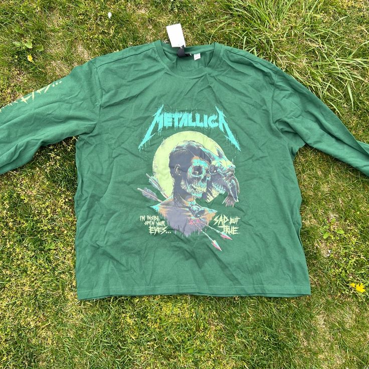 a green long sleeve shirt with an image of a gorilla on it