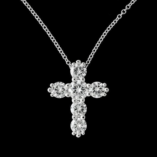 Forever One Moissanite Cross Necklace Gold Pendant Religious Symbol Christianity Six Stones The cross is one of the symbols, used by many religions, such as Christianity. In the end, the cross is the ultimate demonstration of God's power. Necklace is made of 14k white gold and contains shared prongs set forever one moissanites stones (1.75cttw). Cable, gold chain with lobster clasp is included with the price. We offer two different chain length: 16 inch and 18 inch. Dimensions: 19.5mm tall, 15mm Diamond Round Cross Necklace For Anniversary, Diamond Cross Pendant Necklace For Wedding, Wedding Diamond Necklace With Cross Pendant, Spiritual Diamond Cut Necklace For Anniversary, Wedding Necklace With Diamond Cut Cross Pendant, Diamond Cut Cross Necklace For Anniversary, Wedding Cross Pendant Necklace With Diamond Cut, Spiritual Diamond Necklace For Anniversary, Diamond White Cross Pendant Necklace For Wedding