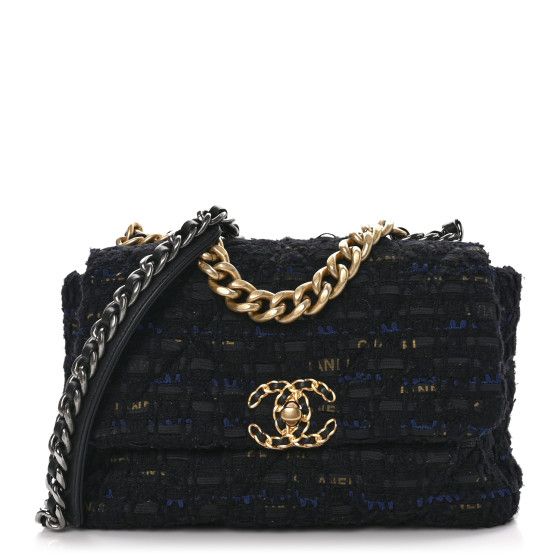 This is an authentic CHANEL Tweed Quilted Medium Chanel 19 Flap in Black, Navy, and Gold.This shoulder bag is crafted of black and navy tweed with a gold Chanel ribbon weaved in. The refined bag features a leather threaded aged gold chain detail CC turn-lock on the flap, a magnetic snap pocket at the rear, and a leather threaded gradient gold to ruthenium chain-link strap with a leather shoulder pad. The front flap opens to a black fabric interior with a zipper pocket. Chanel 19 Bag, Chanel Ribbon, Chanel 19, Chanel Chain, Chanel Tweed, Gold Chanel, Chanel Shoulder Bag, Chanel Model, Handbag Wallet