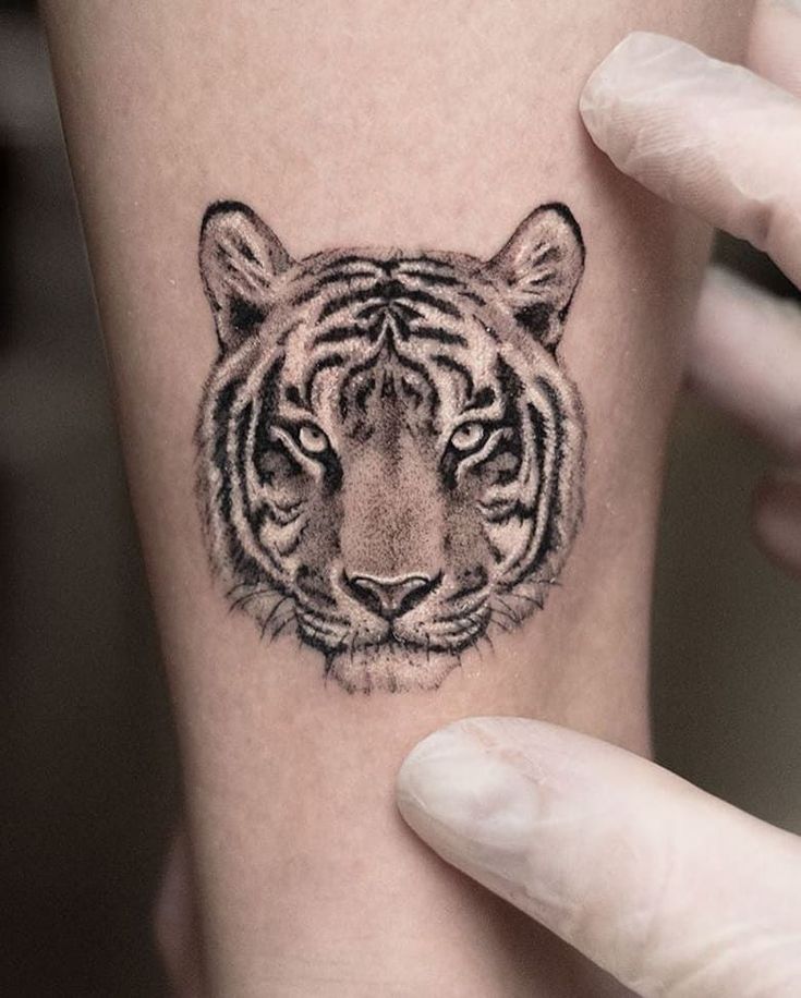 Tiger Tattoos: Placement, Tattoo Styles & Ideas Tattoos Placement, Placement Tattoo, Tiger Face Tattoo, Tiger Head Tattoo, Animal Tattoos For Men, Animals Tattoos, Tiger Tattoos, Face Tattoos For Women, Tiger Tattoo Design