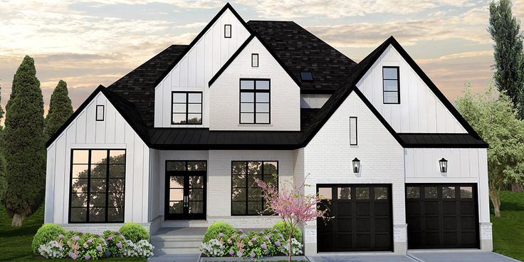 a large white house with black windows and two car garages on the front porch