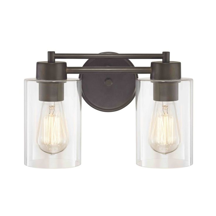 two light bathroom fixture with clear glass shades on the sides and dark bronze finish,