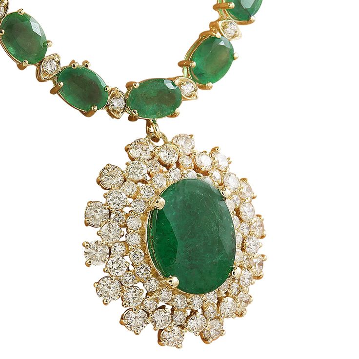 Stamped: 14KTotal Necklace Weight: 36 GramsNecklace Length: 18 InchesCenter Emerald Weight: 6.61 Carat (14.60x11.10 Millimeters)Side Emerald Weight 40.10 Carat (7.00x5.00 Millimeters)Diamond Weight: 5.06 Carat (F-G Color, VS2-SI1 Clarity) Face Measures: 27.35x25.90 MillimetersSKU: [600865] Luxury Oval Necklace With Prong Setting, Oval Emerald Necklaces For Wedding, Gold Diamond-cut Emerald Necklace, Luxury Oval Gold Emerald Necklace, Luxury Gold Oval Emerald Necklace, Luxury Oval Emerald Necklace For Anniversary, Exquisite Oval Emerald Necklace For Formal Occasions, Exquisite Oval Emerald Necklace For Wedding, Formal Hallmarked Oval Diamond Necklace