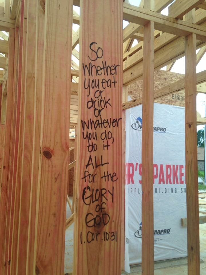 some wooden planks with graffiti on them in the middle of a construction project that is being built