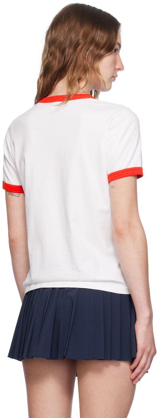 Cotton jersey T-shirt. · Rib knit crewneck and cuffs · Logo graphic flocked at front Supplier color: White White T-shirt With Ribbed Cuffs For College, Sporty Cotton T-shirt With Ribbed Cuffs, Red Crew Neck T-shirt With Embroidered Logo, Casual College Tops With Logo Detail, Sporty Crew Neck Tops With Contrast Trim, Crew Neck Graphic Tee With Embroidered Logo, Embroidered Logo Graphic Tee With Crew Neck, Basic Crew Neck Tops With Logo Detail, Crew Neck Cotton T-shirt With Ribbed Cuffs