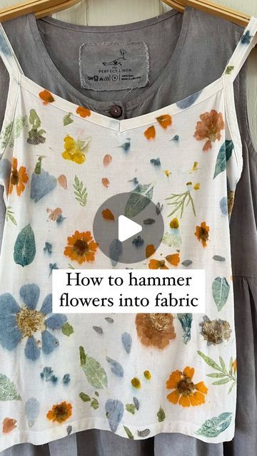 a white shirt with flowers on it and the words how to hammer flowers into fabric