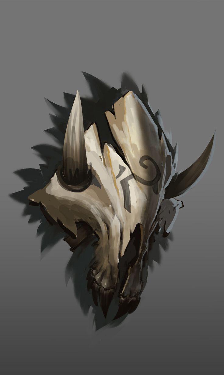 an animal's head with horns and spikes on it