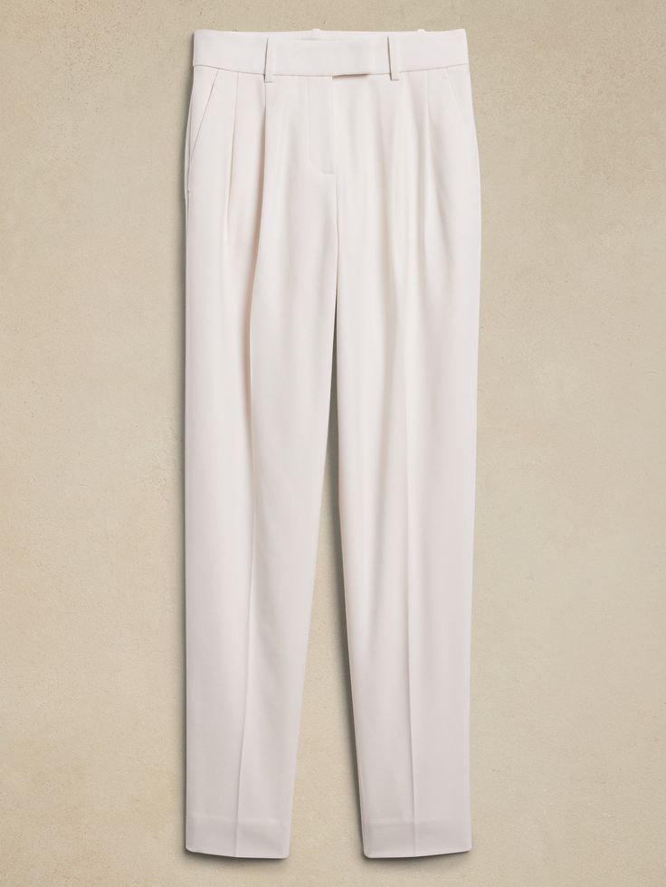 We pulled out all the stops for this classic tuxedo pant, selecting an Italian Barathea fabric woven from wool with a touch of stretch, and using silk charmeuse for its side stripe detail.  Then we cut them in a high-rise straight silhouette so they will stand the test of time.  High rise (9. 5"), straight leg.  Full length.  Fabric from Italy's Marzotto mill.  Zip fly with hook-and-bar closure.  White pant is fully lined.  All other colors are unlined.  High rise, straight leg.  Full length.  I White Pant, Classic Tuxedo, Tuxedo Pants, Petite Shorts, Silk Charmeuse, Tapered Pants, Side Stripe, White Pants, Wedding Suits