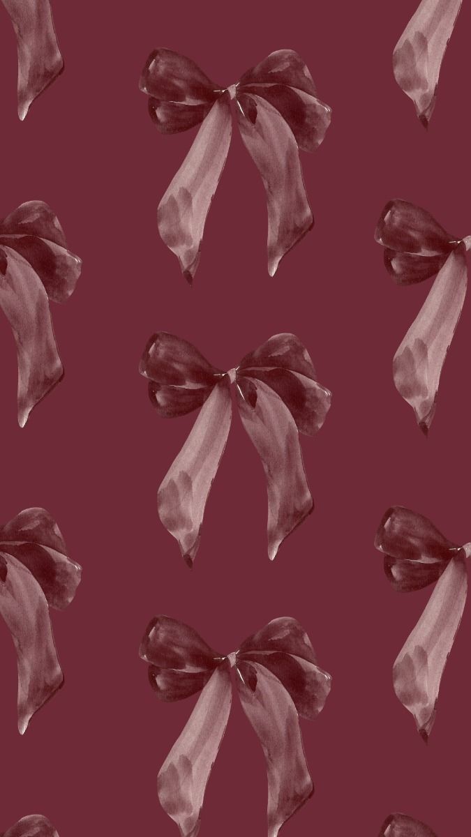 an image of a bow pattern on a maroon background that looks like it has been painted with acrylic paint