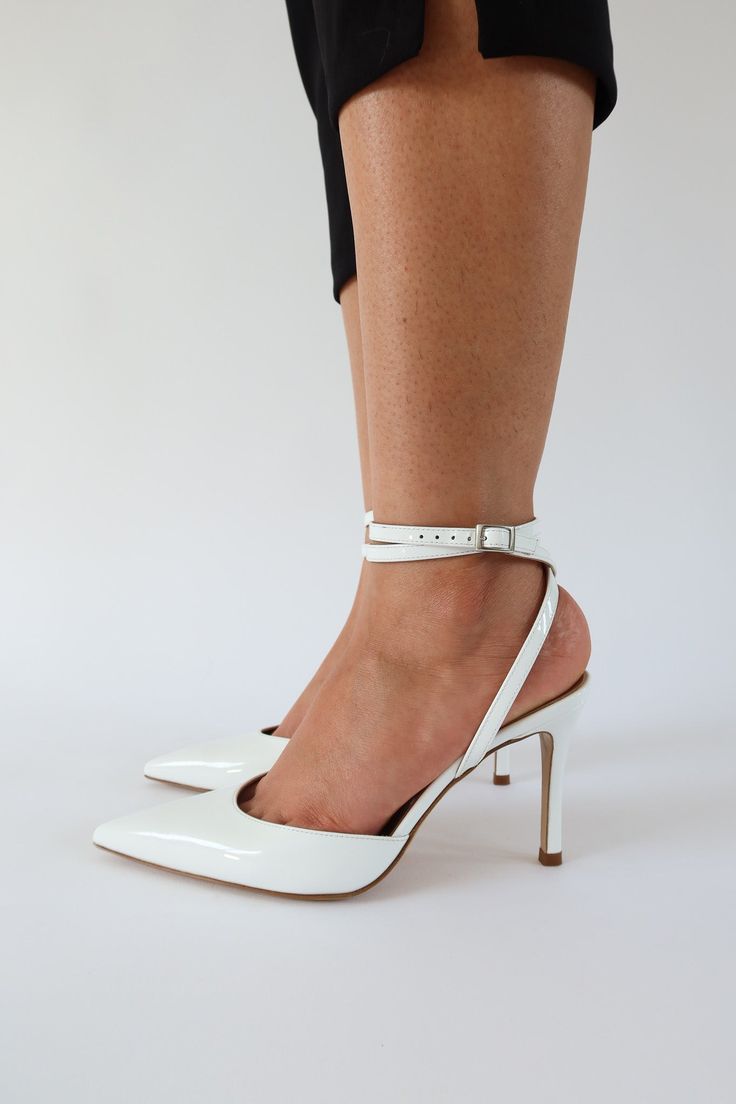 At our favorite heel height of 85mm/3. 35 inches, Iris is a total show stopper. She's sexy, classy, and reliable. With an elongated sharp toe and the security of a double wrap ankle strap, Iris is your new go-to pump. patent leather upper, silver hardware   wipe clean Patent Heels, August Birthstone Jewelry, July Birthstone Jewelry, Leather Socks, Gifts For New Mums, Bridal Look, Pearl Jewellery Earrings, August Birth Stone, Evil Eye Jewelry