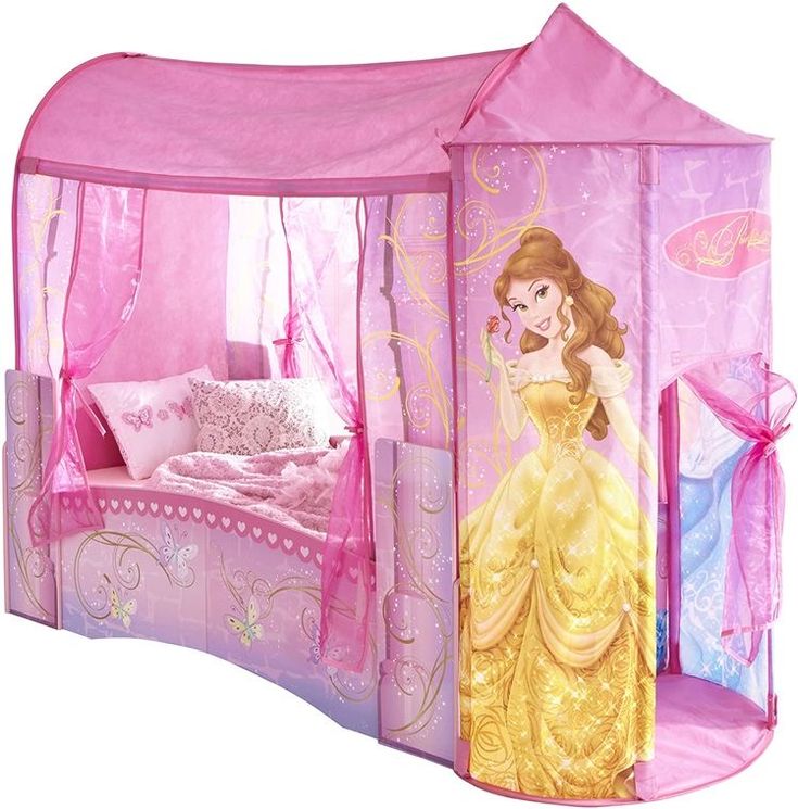 a pink princess bed with a canopy over it