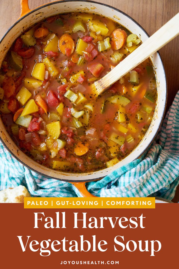 fall harvest vegetable soup in a pot with a wooden spoon on the side and text overlay