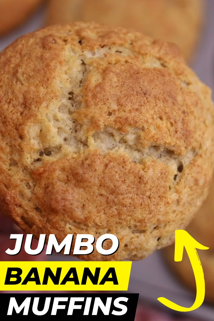 a close up of a muffin on a stick with the words jumbo banana muffins above it